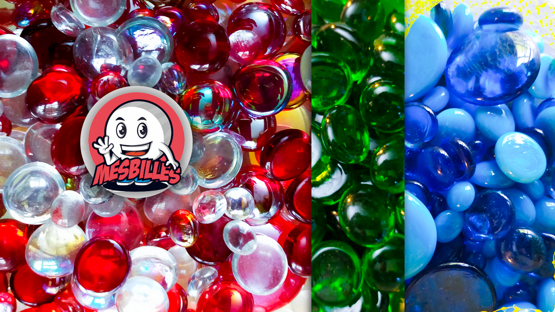 Foto von Bestellungen flacher Murmelnn in verschiedenen Farben, in Tropfen-, Stern- oder Scheibenform.