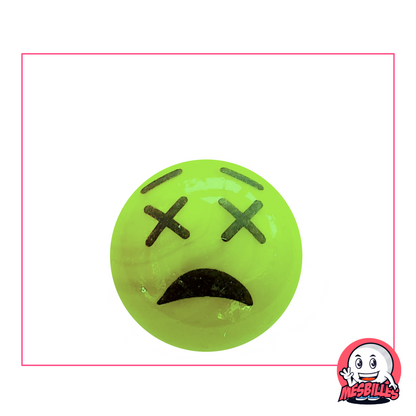 Bille verte avec un visage de smiley choqué : yeux en croix et bouche renversée