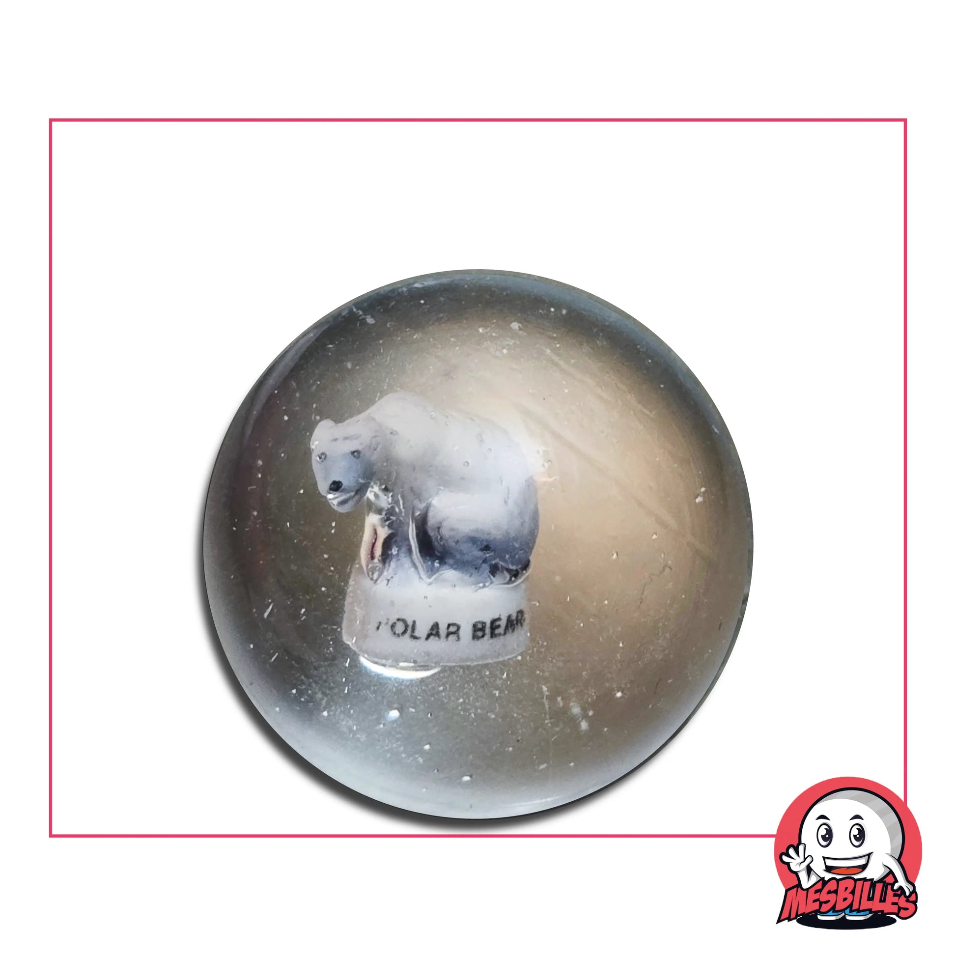 Un ours polaire en porcelaine flotte au centre de cette bille de 35 mm, figé dans un océan de verre translucide