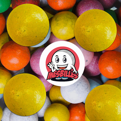 Billes en terre jaune de 25 mm parmi un assortiment coloré – MesBilles